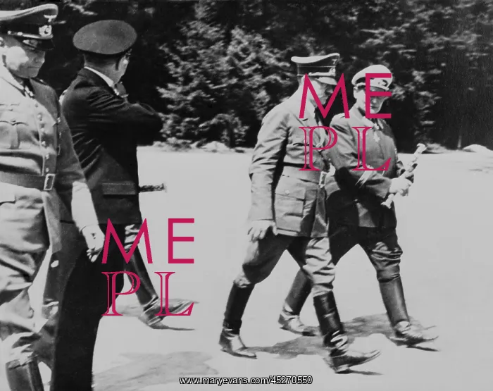 : Adolf Hitler and Hermann Goering walking together : Adolf Hitler and Hermann Goering walking together