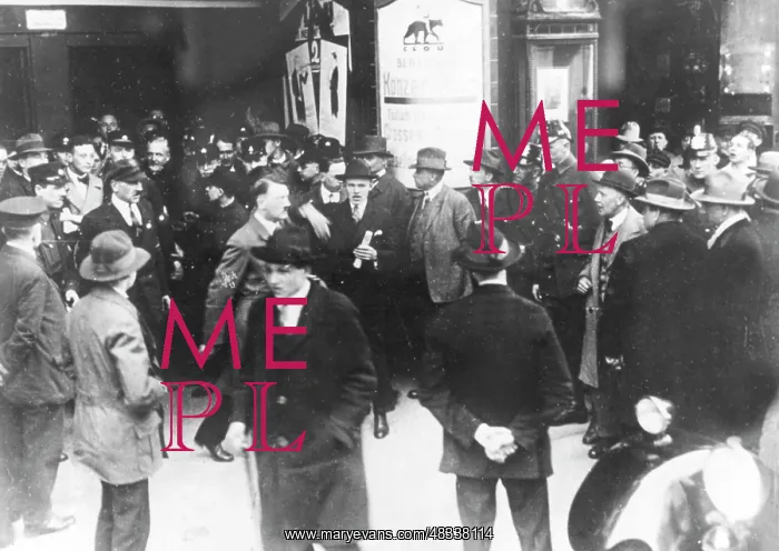 : Adolf Hitler leaving a NSDAP event, 1927 : Adolf Hitler leaving a NSDAP event, 1927
