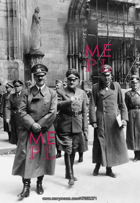 : Adolf Hitler leaving the Strasbourg Cathedral with : Adolf Hitler leaving the Strasbourg Cathedral with