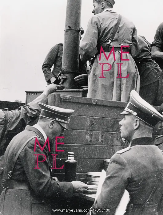 : Adolf Hitler with Rommel at field kitchen dinner break : Adolf Hitler with Rommel at field kitchen dinner break