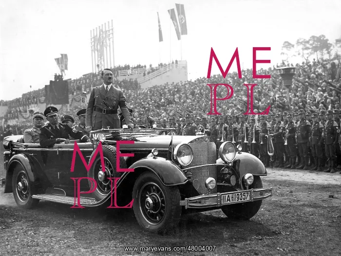 : Adolf Hitler standing in car on arrival in Nuremberg : Adolf Hitler standing in car on arrival in Nuremberg