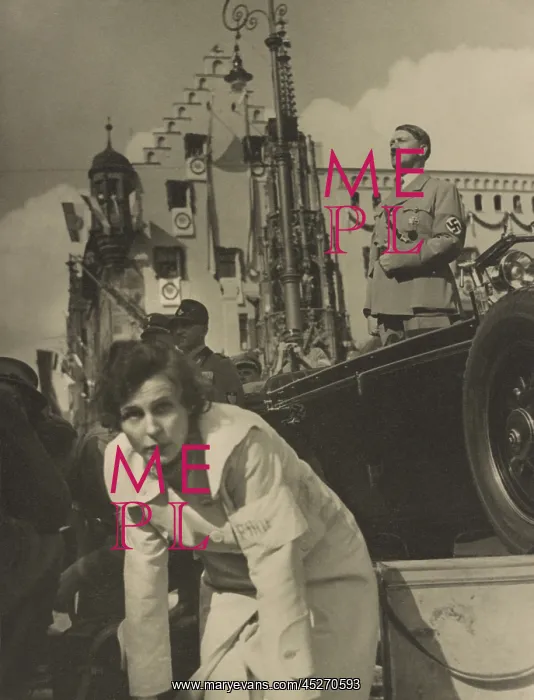 : Adolf Hitler standing in an open automobile, with : Adolf Hitler standing in an open automobile, with