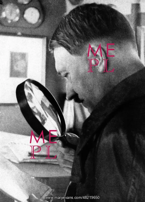 : Adolf Hitler studies a map of Austria, 1938 : Adolf Hitler studies a map of Austria, 1938