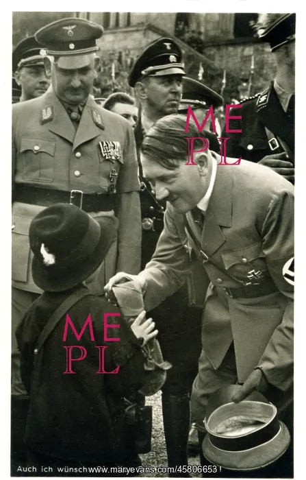 : Adolf Hitler talking to a child at a Rally : Adolf Hitler talking to a child at a Rally