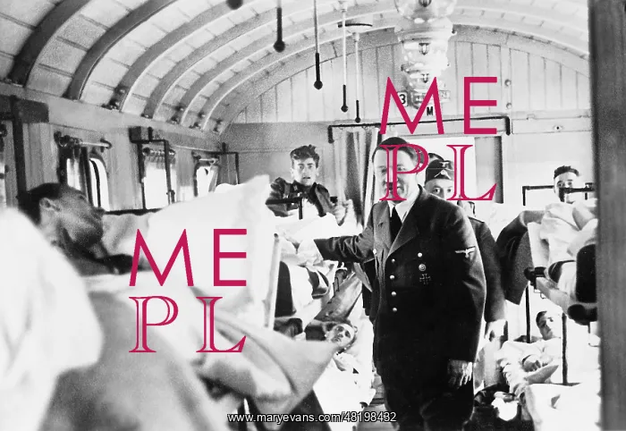 : Adolf Hitler during a visit of a transporter for the wounded : Adolf Hitler during a visit of a transporter for the wounded