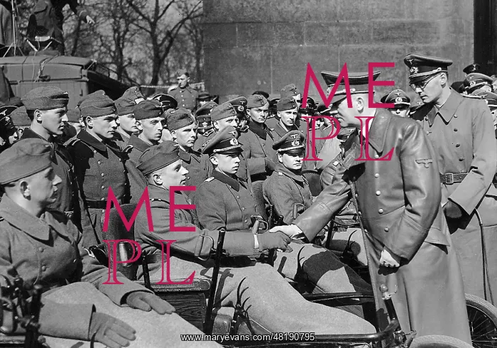 : Adolf Hitler with war wounded, 1943 : Adolf Hitler with war wounded, 1943