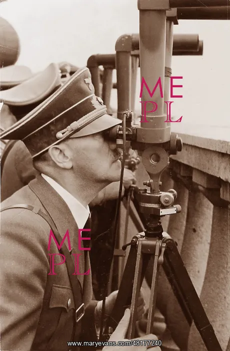 : Adolf Hitler watching the attack on Warsaw through a perisco : Adolf Hitler watching the attack on Warsaw through a perisco