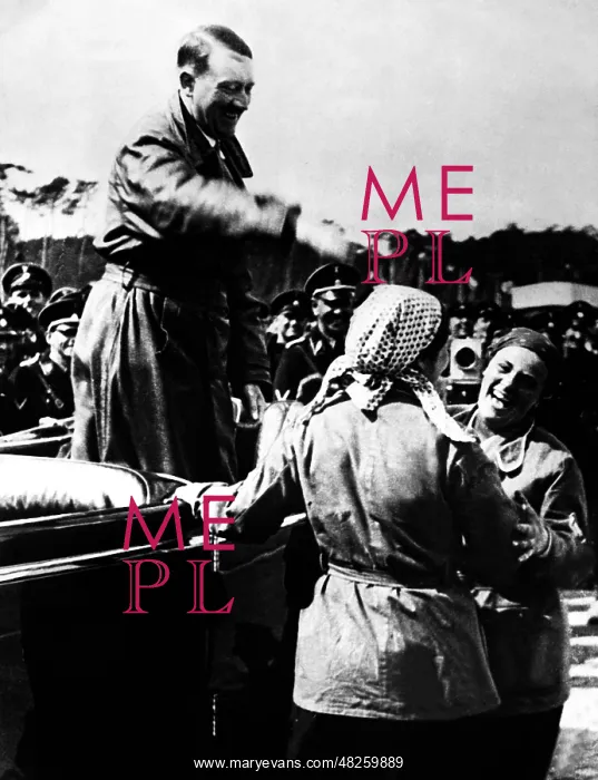 : Adolf Hitler with women in work clothes, 1935 : Adolf Hitler with women in work clothes, 1935