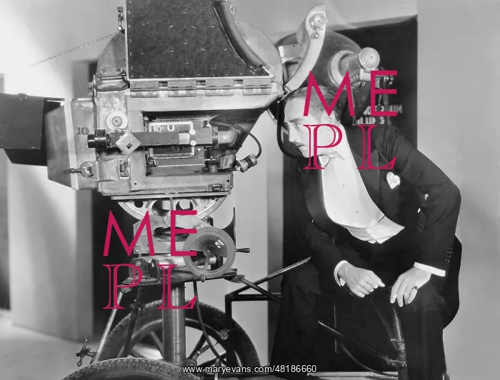 : Adolphe Menjou behind a film camera, 1930 : Adolphe Menjou behind a film camera, 1930