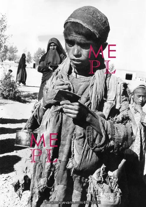 : Afghan youngster in a UNICEF feeding line ? : Afghan youngster in a UNICEF feeding line ?