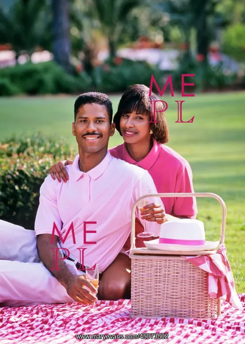 : African-American Couple Sitting Looking at Camera on : African-American Couple Sitting Looking at Camera on