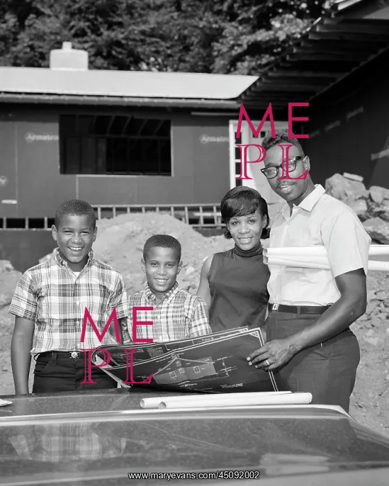 : African American Family Standing Before Their : African American Family Standing Before Their