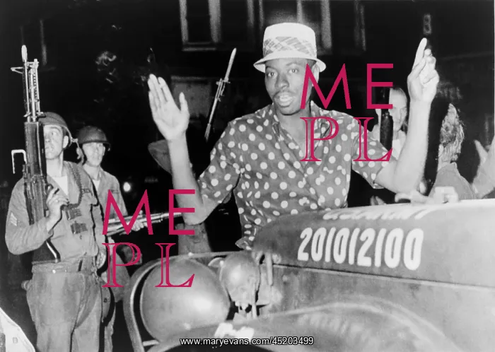: African American man with arms raised in ? : African American man with arms raised in ?