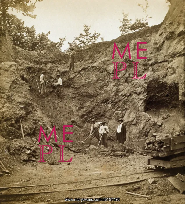 : Several African American men working on ? : Several African American men working on ?