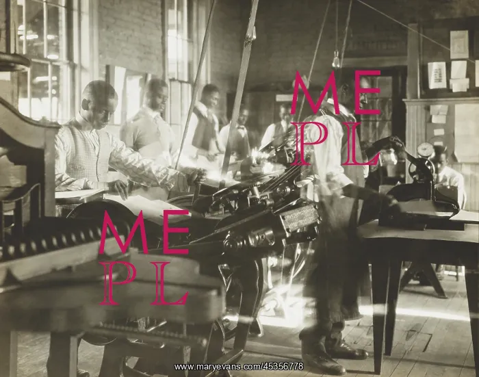 : African American men working at printing presses : African American men working at printing presses