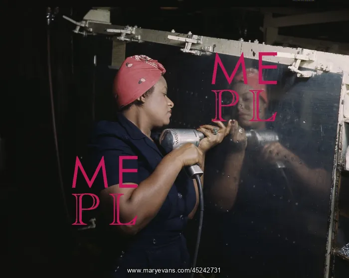 : An African American Rosy the Riveter, operating ? : An African American Rosy the Riveter, operating ?