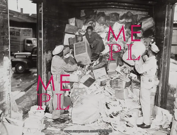 : African American soldiers loading trash on a freight : African American soldiers loading trash on a freight