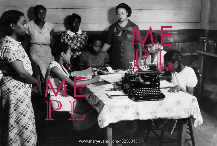 : African American students at work in a library : African American students at work in a library