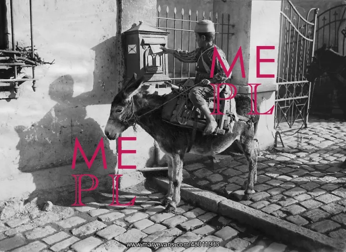 : An African posts a letter in the mailbox, 1925 : An African posts a letter in the mailbox, 1925