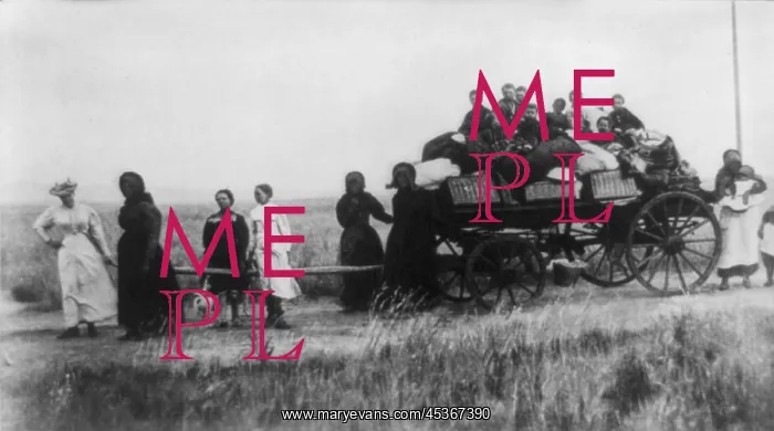 : Afrikaner women pulling a wagon with their children : Afrikaner women pulling a wagon with their children