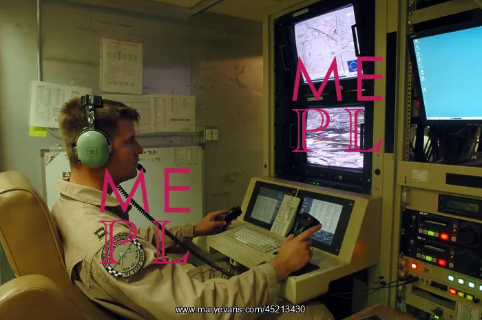 : An Air Force officer maneuvers an unmanned ? : An Air Force officer maneuvers an unmanned ?