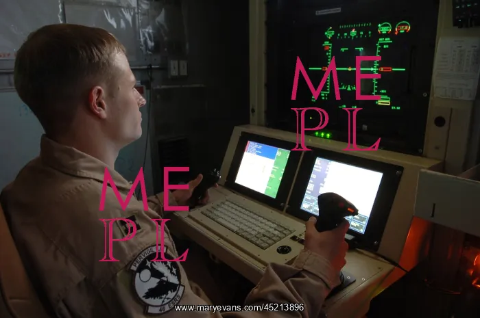 : An Air Force officer maneuvers an unmanned ? : An Air Force officer maneuvers an unmanned ?