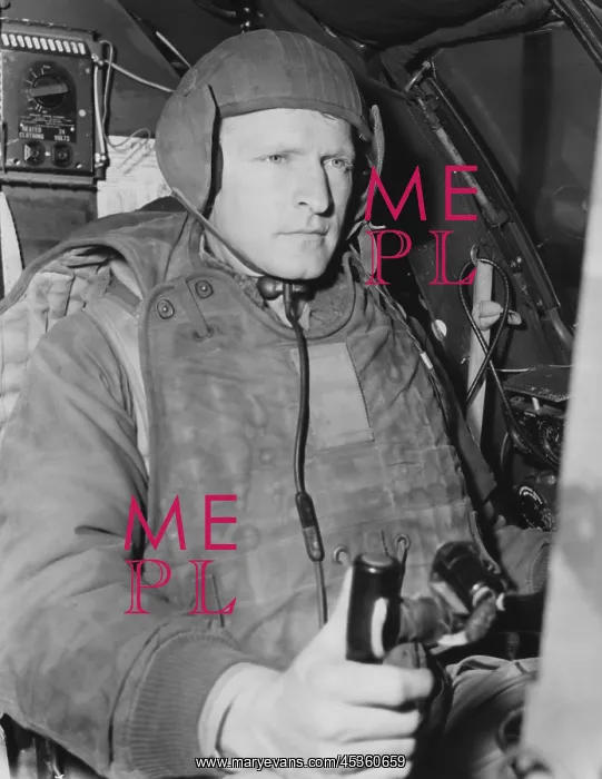 : Air Force pilot at the controls of his B-29 just : Air Force pilot at the controls of his B-29 just