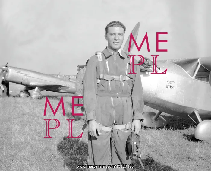  : Airman posing by Praga E-115.1 aircraft