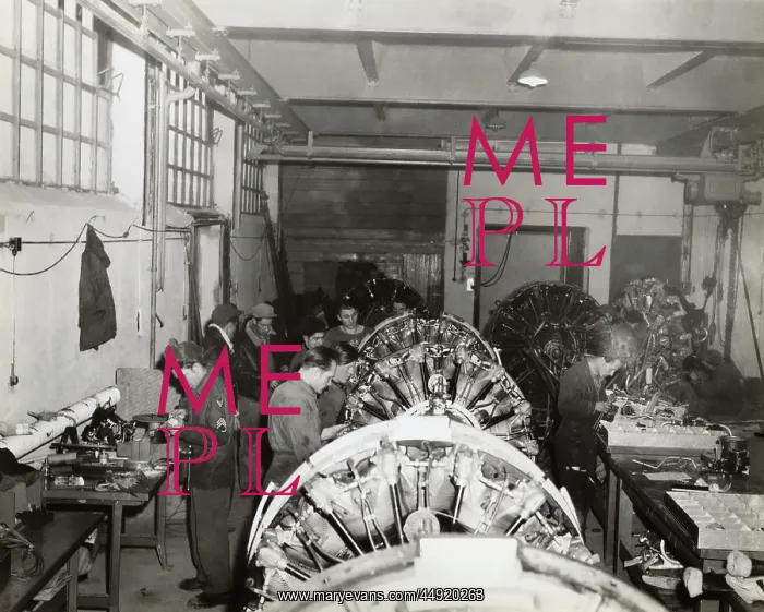 : Airmen Maintaining Aero Engine at the Headquarters of th? : Airmen Maintaining Aero Engine at the Headquarters of th?