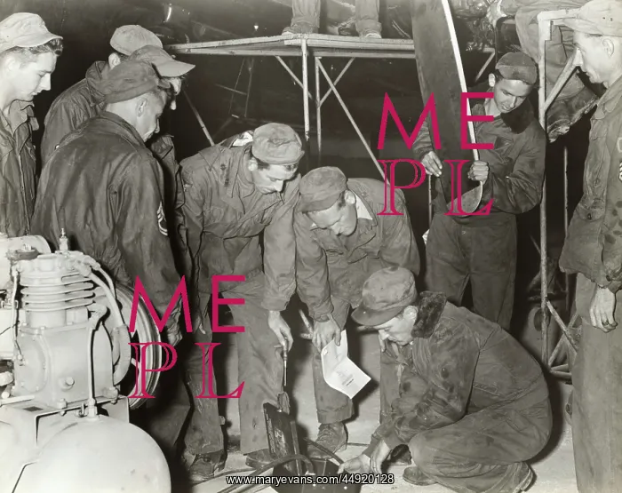 : Airmen Maintaining Components at the Headquarters of the? : Airmen Maintaining Components at the Headquarters of the?