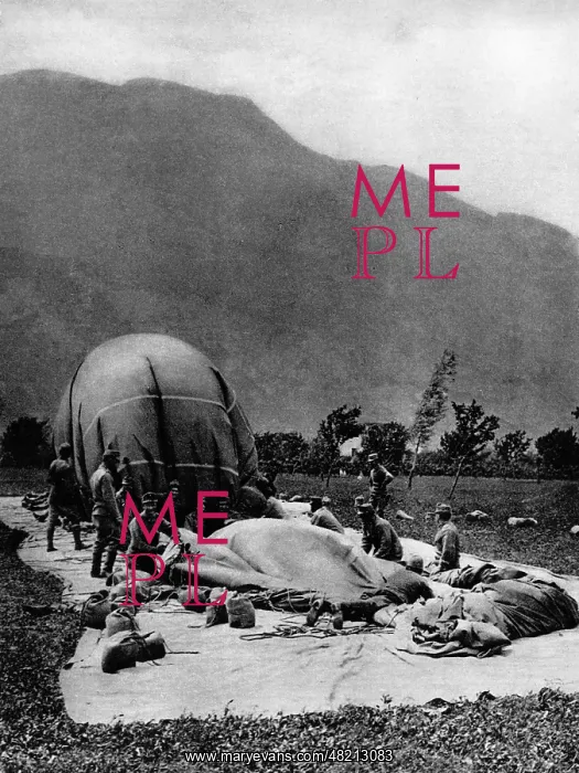 : Airship crewmen empty a moored balloon, 1918 : Airship crewmen empty a moored balloon, 1918