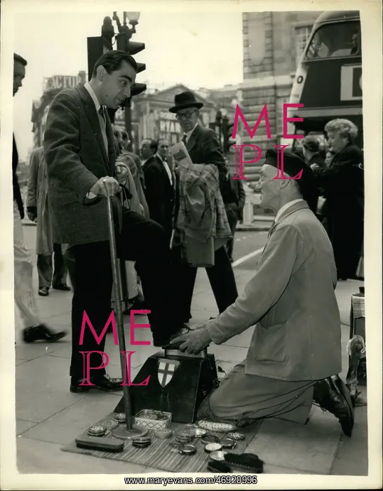 : Alex Samuels, American playwright, has a shoe shine, London : Alex Samuels, American playwright, has a shoe shine, London