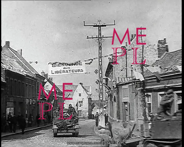 : Allied Vehicles Passing Through Belgian Town : Allied Vehicles Passing Through Belgian Town