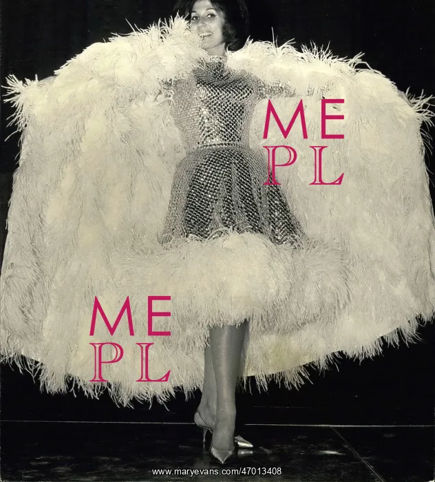 : Alma Cogan, singer, in feathery costume : Alma Cogan, singer, in feathery costume
