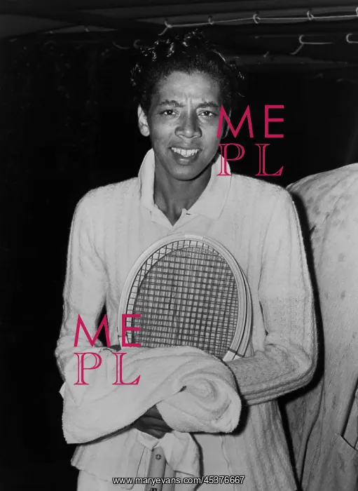 : Althea Gibson, takes refuge from rain while : Althea Gibson, takes refuge from rain while