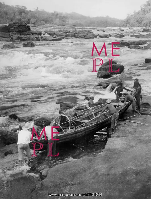 : Amazon Indians launch their boat, 1938 : Amazon Indians launch their boat, 1938
