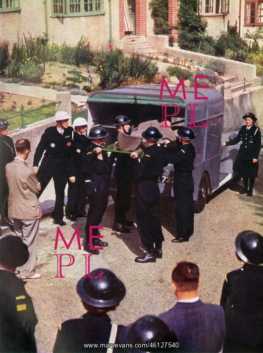 : An Ambulance with Wardens helping in an emergency : An Ambulance with Wardens helping in an emergency