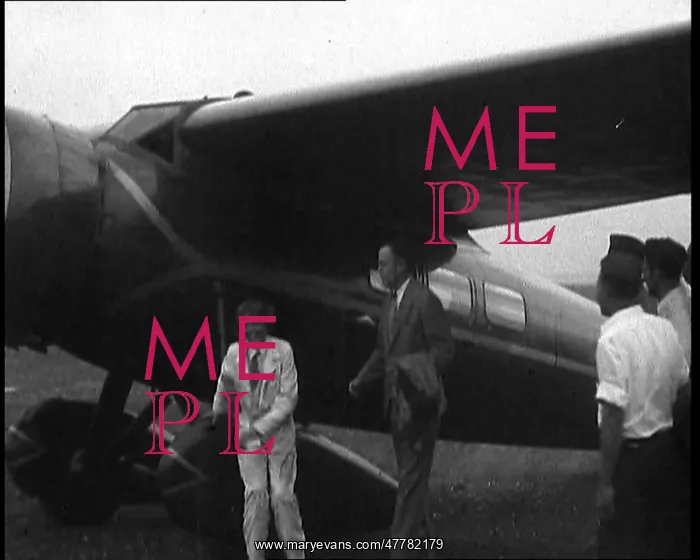 : Amelia Earhart Exiting Her Plane : Amelia Earhart Exiting Her Plane