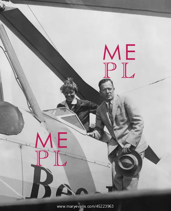 : Amelia Earhart greeted by her husband George ? : Amelia Earhart greeted by her husband George ?