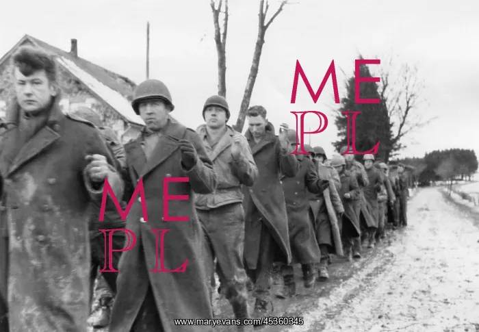 : American prisoners of war are marched along a road : American prisoners of war are marched along a road