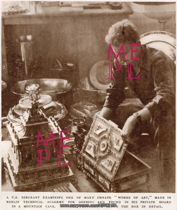 : American Sergeant examining objects : American Sergeant examining objects