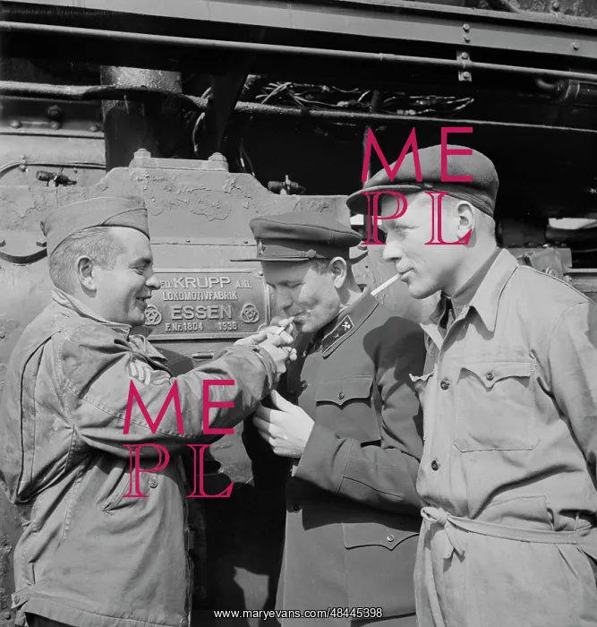 : An American Sergeant railroader lighting the : An American Sergeant railroader lighting the