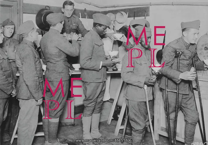 : American soldiers getting their food in the : American soldiers getting their food in the