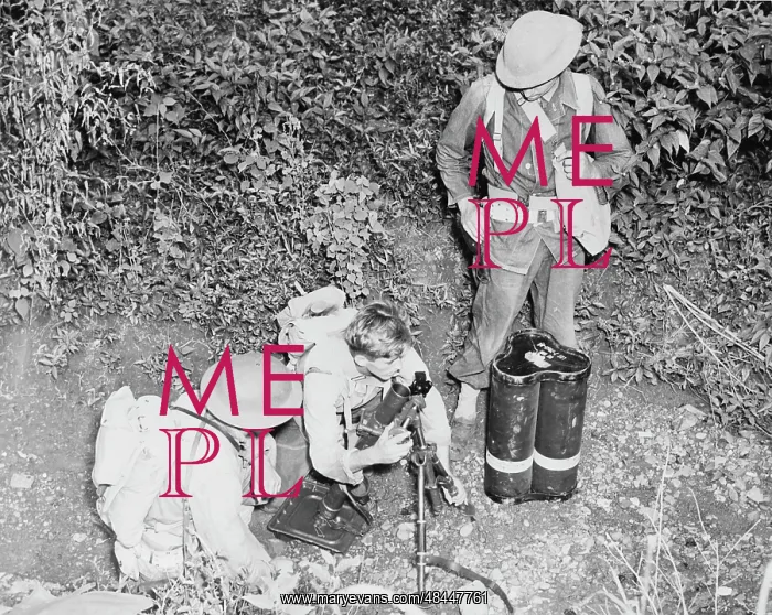 : American troops set up a small trench mortar : American troops set up a small trench mortar