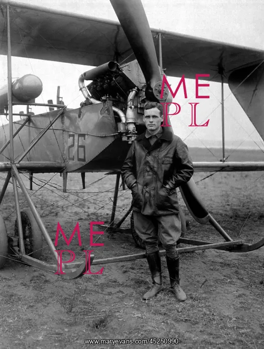 : American World War I era pilot with his plane : American World War I era pilot with his plane