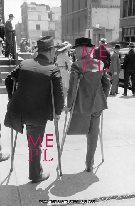 : Two amputees on crutches outside church ? : Two amputees on crutches outside church ?