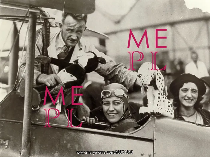 : Amy Johnson with her mascots and engineer Jack Humphries : Amy Johnson with her mascots and engineer Jack Humphries
