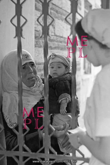 : Anatolian peasant with her child in front of : Anatolian peasant with her child in front of