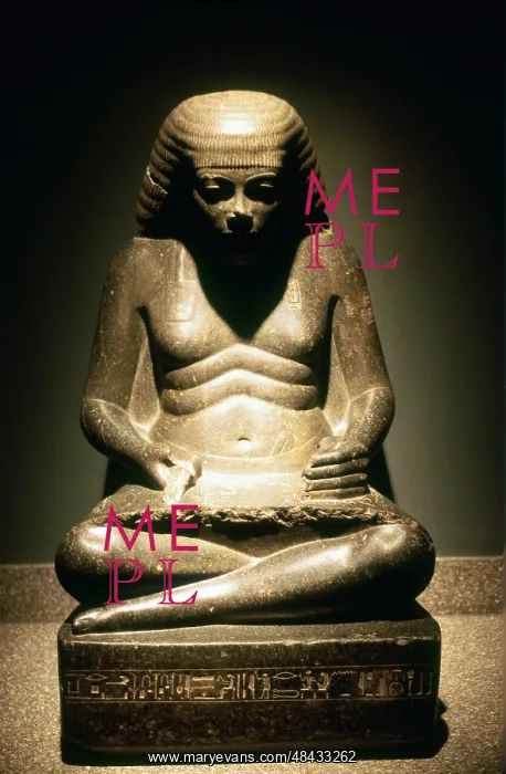 : Ancient Egyptian scribe, seated. Granite statue : Ancient Egyptian scribe, seated. Granite statue