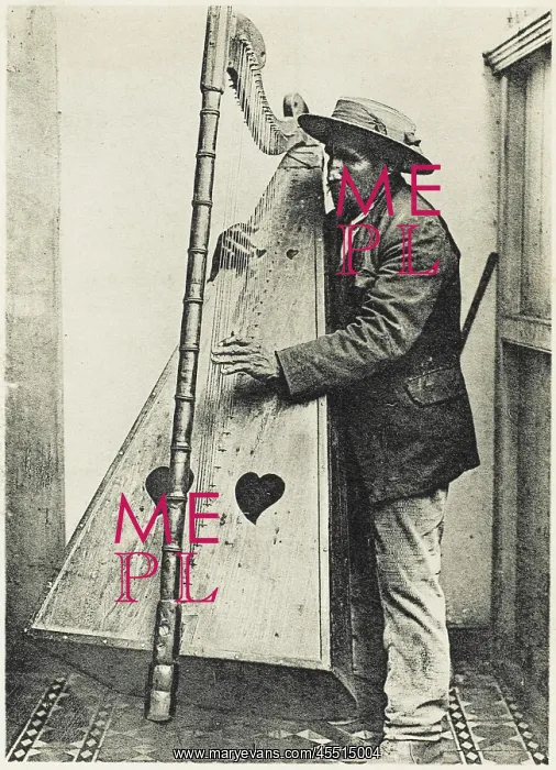 : An Andean Harpist with his harp : An Andean Harpist with his harp
